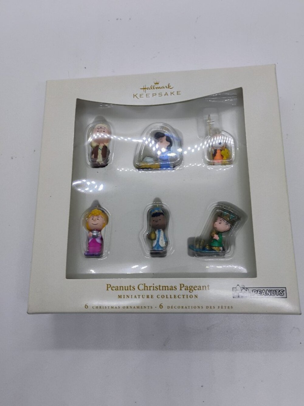 New in box: Hallmark Peanut MINIATURE Christmas ornaments.